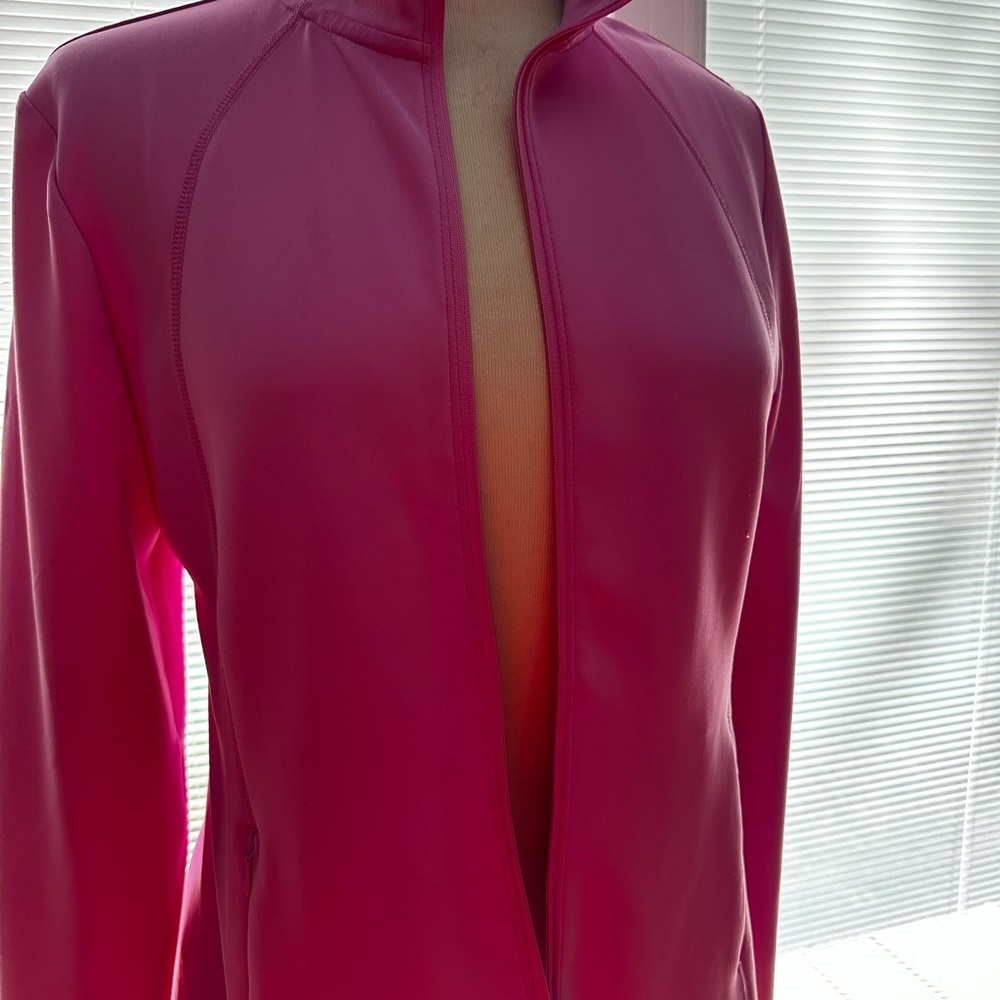 Pink Barbie jacket for the office or the activewear. Nice pockets and zipper.